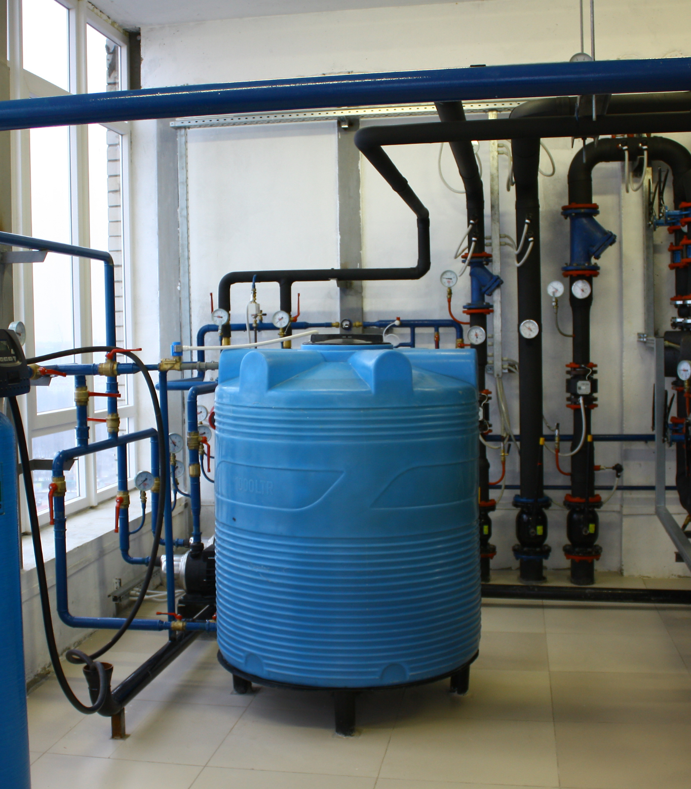 Large water storage tank treated with chlorine dioxide for water quality and disinfection.